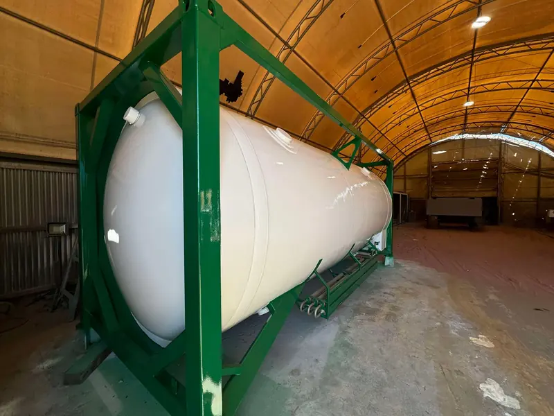 Tank mounted in a green fabricated steel frame in the Kwinana workshop
