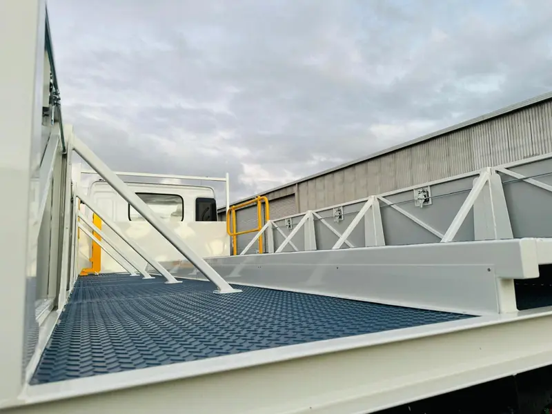 Custom steel vehicle deck with truss sides and mesh flooring fabricated in Kwinana, WA